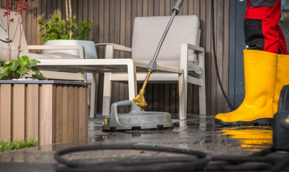 cleaning-concrete-surface-patio-with-a-pressure-wa-2023-11-27-05-21-18-utc